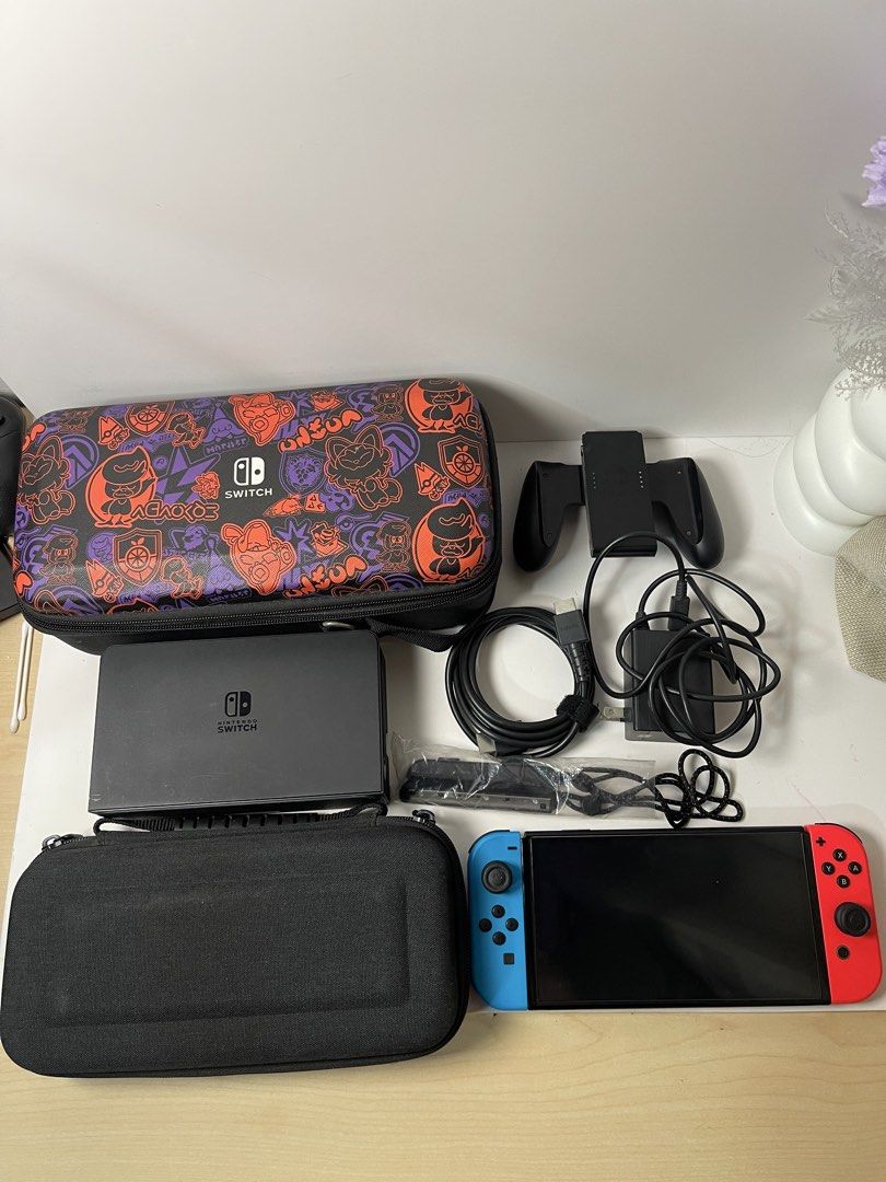 Switch OLED Neon Red & Blue 99% Smooth + 3 Bonus Cases & Grips (Category: Nintendo) located in Pasig City. Submitted by tjfindspreloveditems (Listing ID 1467517987, Image 1). Description: 🎮 FOR SALE 🎮 Nintendo Switch OLED Neon Red & Blue 🔴🔵🎮 💰 ₱10,990 fixed 📋 Condition: ✅ 99% smooth ✅ All buttons working ✅ Can connect to eShop ✅ No stick drifts ✅ Tempered glass since day 1 ✅ Used sparingly 📦 Inclusions: • Original Nintendo Adapter • Origi