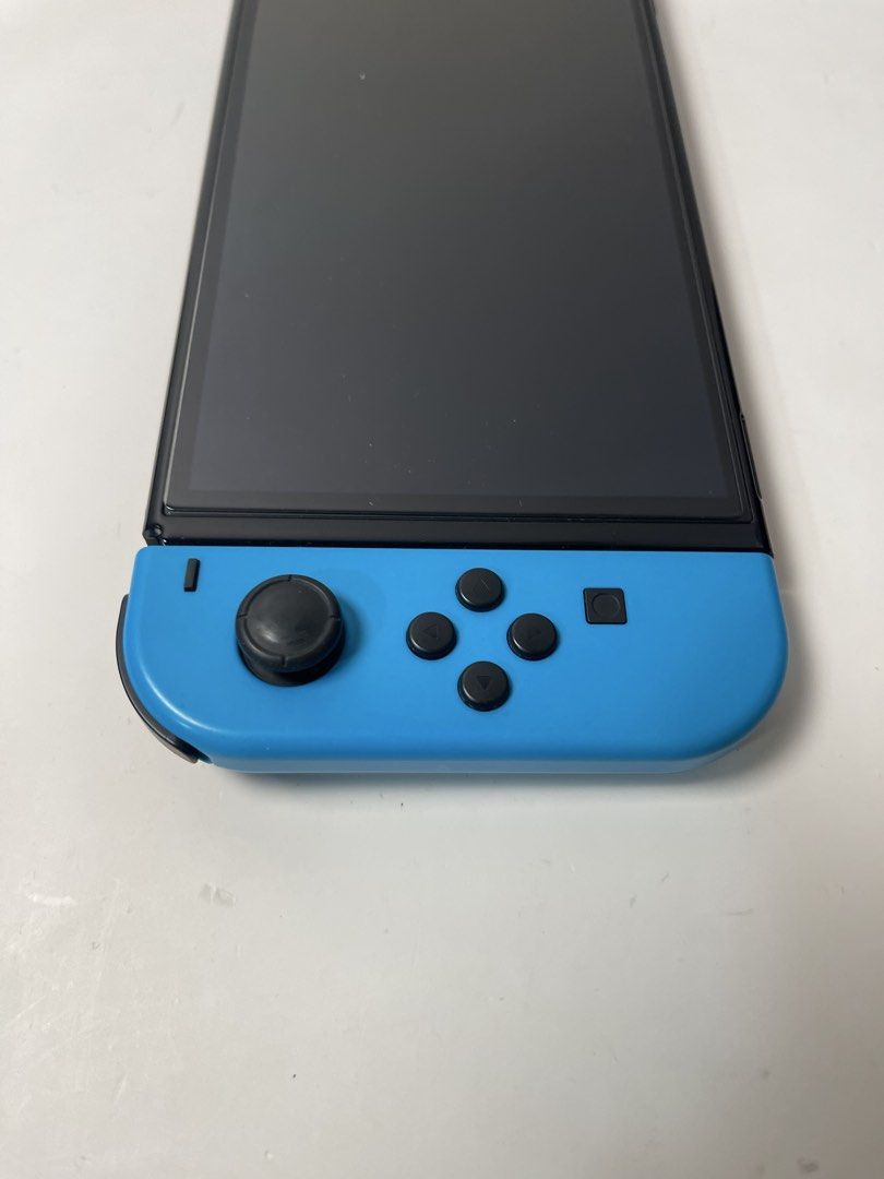 Switch OLED Neon Red & Blue 99% Smooth + 3 Bonus Cases & Grips (Category: Nintendo) located in Pasig City. Submitted by tjfindspreloveditems (Listing ID 1467517987, Image 3). Description: 🎮 FOR SALE 🎮 Nintendo Switch OLED Neon Red & Blue 🔴🔵🎮 💰 ₱10,990 fixed 📋 Condition: ✅ 99% smooth ✅ All buttons working ✅ Can connect to eShop ✅ No stick drifts ✅ Tempered glass since day 1 ✅ Used sparingly 📦 Inclusions: • Original Nintendo Adapter • Origi