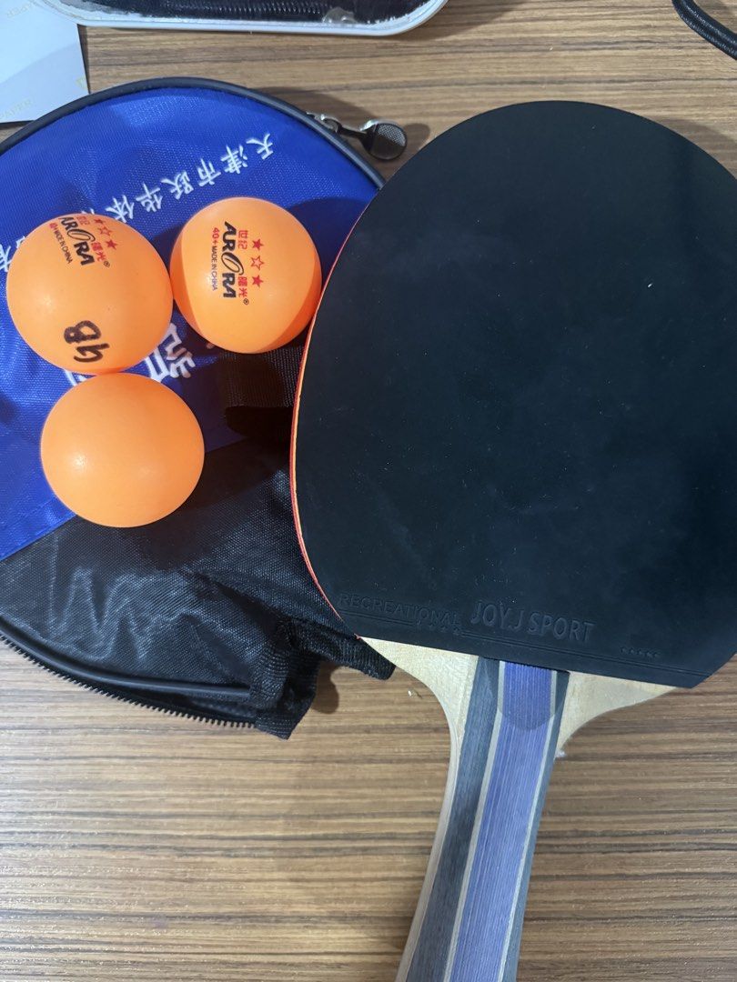 Table Tennis Racket Set with Balls and Case (Category: Racket and Ball Sports) located in Manila. Submitted by monkaehihi (Listing ID 1467485646, Image 2). Description: - table tennis paddle - Includes 3 Aurora orange table tennis balls - Zippered blue carry case .