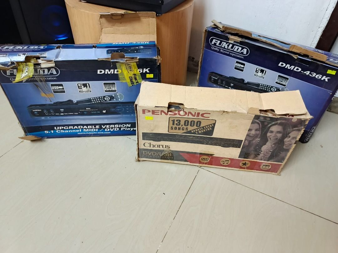 TAKE ALL, CD/DVD/USB SD Card Karaoke Player, as is (Category: Portable Music Players) located in Mabalacat. Submitted by Jayofy (Listing ID 1467473538, Image 1). Description: Item Name: TAKE ALL, MIDI/DVD Player Brand: 2-FUKUDA/ 1- PENSONIC Model: DMD-436K Voltage: 220V / < 35W Item Name: CD/DVD/USB SD Card Karaoke Player Brand: PENSONIC Model: Chorus Color: Black Input Voltage: 220VC AC Status: * lightly used, functional, as-is * mild scratches 