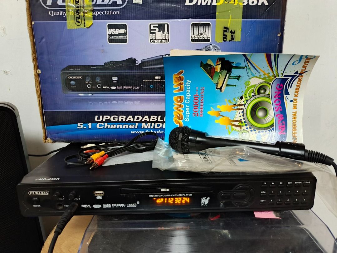 TAKE ALL, CD/DVD/USB SD Card Karaoke Player, as is (Category: Portable Music Players) located in Mabalacat. Submitted by Jayofy (Listing ID 1467473538, Image 2). Description: Item Name: TAKE ALL, MIDI/DVD Player Brand: 2-FUKUDA/ 1- PENSONIC Model: DMD-436K Voltage: 220V / < 35W Item Name: CD/DVD/USB SD Card Karaoke Player Brand: PENSONIC Model: Chorus Color: Black Input Voltage: 220VC AC Status: * lightly used, functional, as-is * mild scratches 