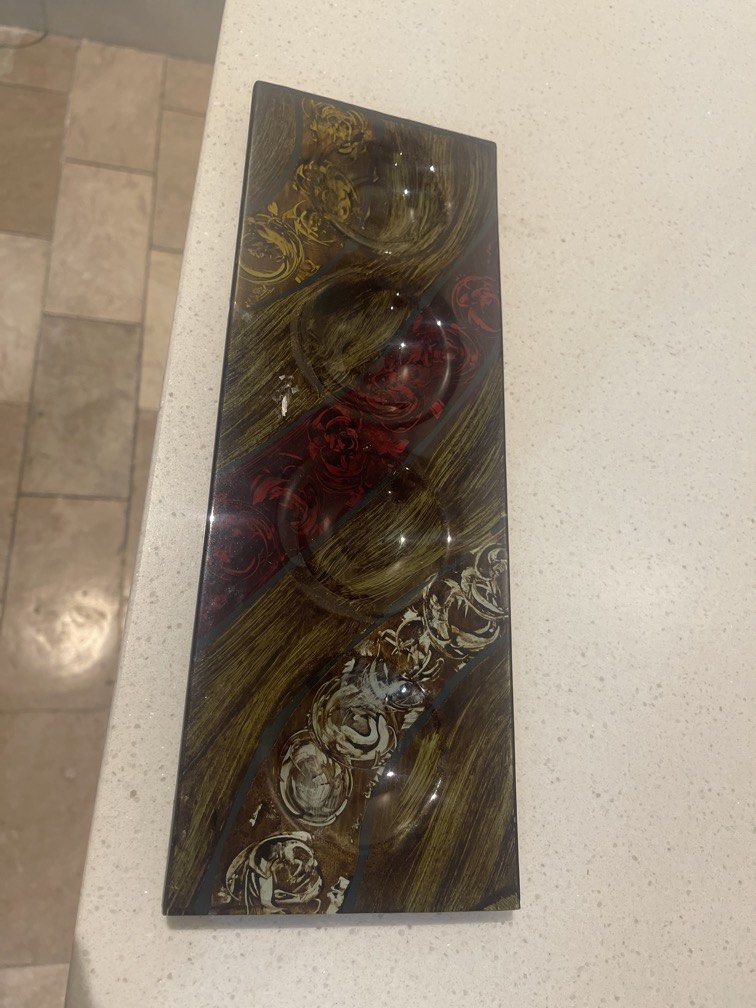 Tea light or votive candle holder (Category: Other Home Decor) located in Manila. Submitted by lunafloppy (Listing ID 1467363243, Image 1). Description: Multicolor art glass featuring a swirl or marbled pattern..