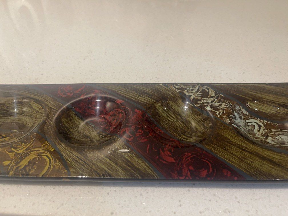 Tea light or votive candle holder (Category: Other Home Decor) located in Manila. Submitted by lunafloppy (Listing ID 1467363243, Image 2). Description: Multicolor art glass featuring a swirl or marbled pattern..