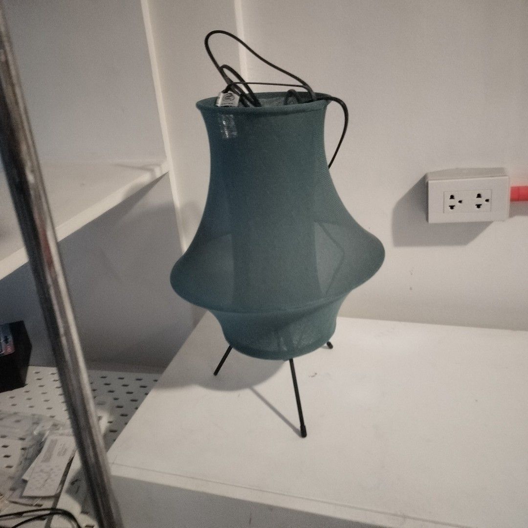 Teal Fabric Tripod Lamp Floor and Table Set (Category: Lighting) located in Valenzuela. Submitted by newbear.425b6e (Listing ID 1467410959, Image 2). Description: - Matching Set: Includes both a tall floor lamp and a smaller table lamp - - Design: Modern teal fabric shades paired with sleek black metal tripod legs - Lighting: Provides soft, cozy diffused lighting for any room - Condition: Fully working with standard plugs, clean fabric with no st