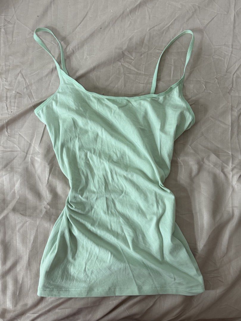Teal tank top (Category: Sleeveless) located in Quezon City. Submitted by gem_210 (Listing ID 1467410816, Image 1). Description: > DM for more pictures > Can fit xs - m.