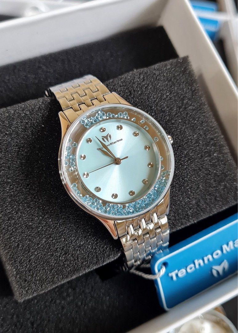 TechnoMarine Brillantezza Del Mare (Category: Women's Watches) located in Caloocan City. Submitted by mode.manila (Listing ID 1467372832, Image 1). Description: - 34mm - Brand: TechnoMarine - Condition: Brand new, never worn, pristine condition - Dial: Light blue with floating blue crystals around the bezel - Strap: Silver-tone metal bracelet - Movement: Quartz movement with analog display - Inclusions: Original branded box and hang tag included.