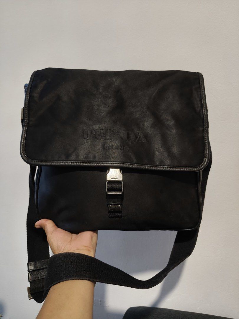 TESSUTO P R A D A NYLON MESSENGER BAG (Category: Luxury Bags & Wallets) located in Manila. Submitted by laizacollections (Listing ID 1467537447, Image 1). Description: .