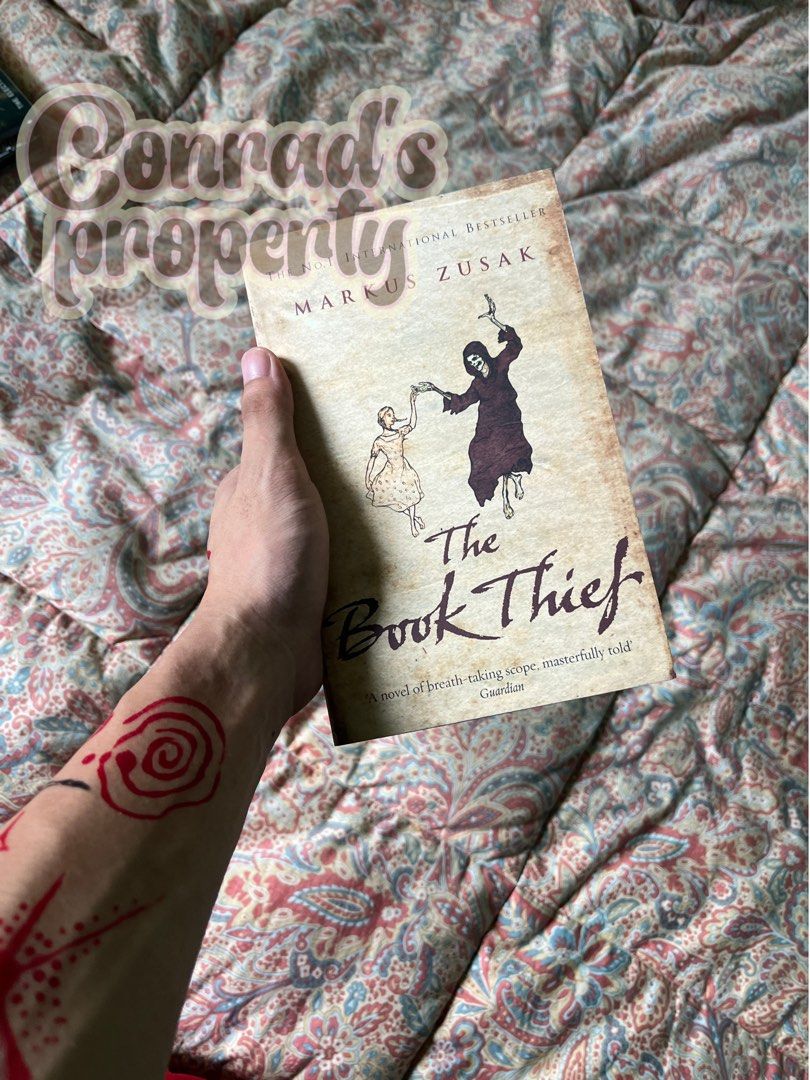 The Book Thief by Markus Zusak paperback (Category: Storybooks) located in Camiling. Submitted by conradsimon (Listing ID 1467401811, Image 2). Description: Book Thief novel written by Markus Zusak. International bestseller edition. Softcover paperback format. Pages show mild yellowing from age. Binding remains solid and intact. Great read for fiction fans..