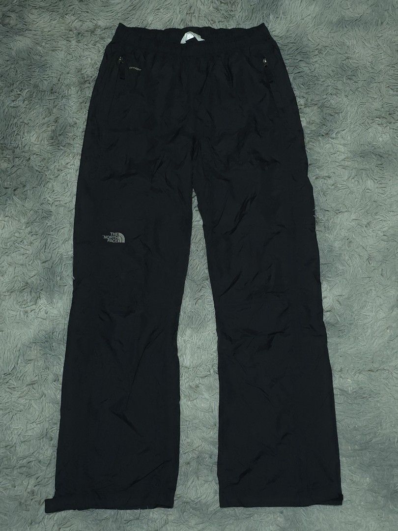 The North Face DryVent Black Waterproof Pants (Category: Trousers) located in Abulug. Submitted by humanwhosellthings (Listing ID 1467365649, Image 1). Description: Black waterproof pants from The North Face. DryVent technology fabric keeps moisture out. Elastic waistband for an easy fit, plus zippered pockets to secure your small items. Subtle branding embroidery on the leg. Great choice for outdoor hikes or rainy weather. ✅Excellent Condition ✅