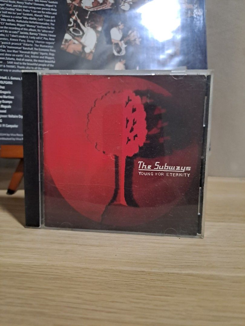 The Subways Young for Eternity CD (Category: CDs & DVDs) located in Las Pinas. Submitted by cobieshop (Listing ID 1467508706, Image 1). Description: - Artist & Album: The Subways - Young for Eternity - Format: Standard jewel case CD - Cover Art: Iconic red design with silhouette tree artwork - Genre: Classic indie rock - Condition: Great addition to any physical music collection or CD shelf - Meet-ups or shipping options available.