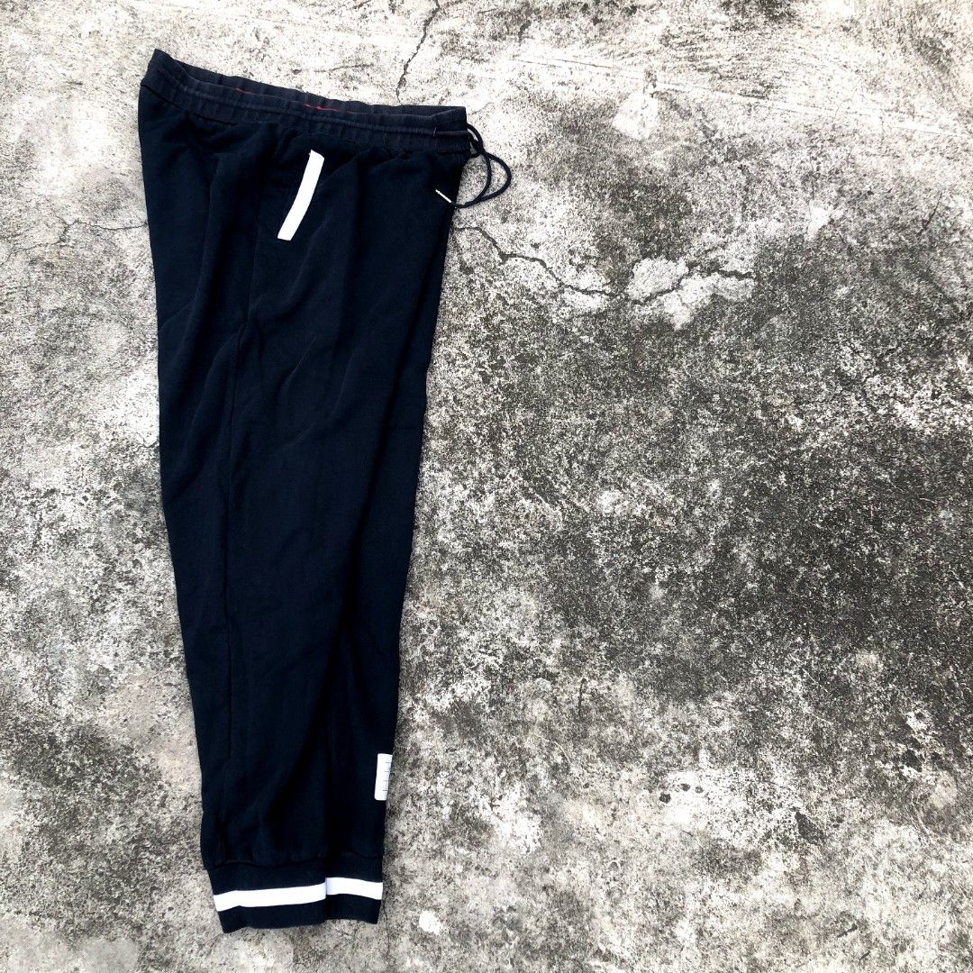 Thom browne (made in japan) (Category: Joggers) located in General Santos City (Dadiangas). Submitted by daily_grailed.ph (Listing ID 1467563181, Image 2). Description: Size 5 On tag NewYork made in Japan 💯 Thom browne Dark blue Jogger pants (authentic condition 9.5/10) ✨ waistline 34-36 mens 💥 message me for more info, lego. 🍋‍🟩.