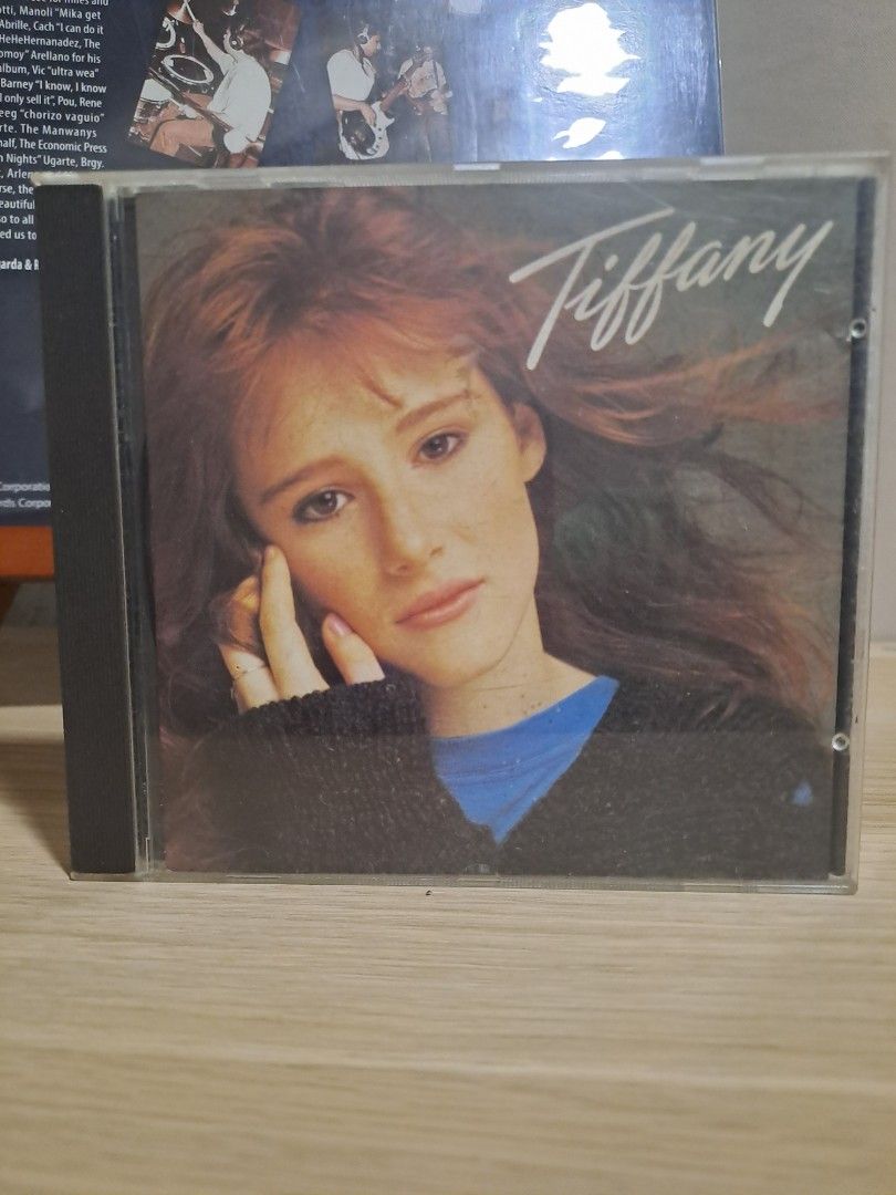 Tiffany self-titled debut album audio CD (Category: CDs & DVDs) located in Las Pinas. Submitted by cobieshop (Listing ID 1467482782, Image 1). Description: - Album: Tiffany (Self-Titled Debut Album) - Format: Audio CD in standard jewel case - Condition: Disc plays normally - Key Track: Features the 80s hit single 'I Think We're Alone Now' - Perfect for: Retro music collectors and 80s pop enthusiasts.