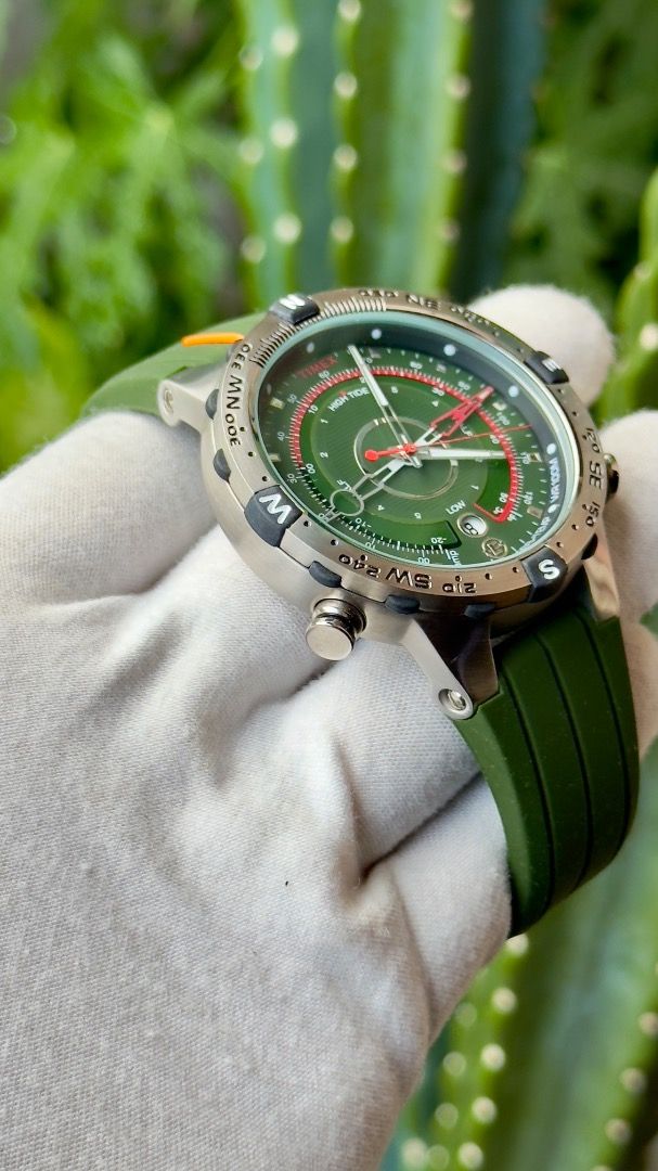 Timex Tide Temp Compass Green Silicone Strap Watch (Category: Men's Watches) located in Manila. Submitted by junjun12356 (Listing ID 1467575852, Image 3). Description: - Brand/Model: Timex Adventure Watch - Color: Green dial with matching green silicone strap - Case: Stainless steel with a rotating compass bezel - Features: Multi-function sub-dials for tide, temperature, and compass headings, plus a date window - Water Resistance: Up to 100 meter