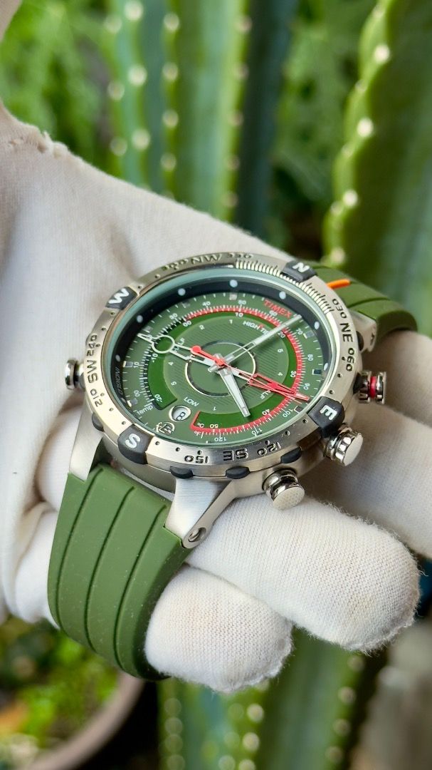 Timex Tide Temp Compass Green Silicone Strap Watch (Category: Men's Watches) located in Manila. Submitted by junjun12356 (Listing ID 1467575852, Image 2). Description: - Brand/Model: Timex Adventure Watch - Color: Green dial with matching green silicone strap - Case: Stainless steel with a rotating compass bezel - Features: Multi-function sub-dials for tide, temperature, and compass headings, plus a date window - Water Resistance: Up to 100 meter