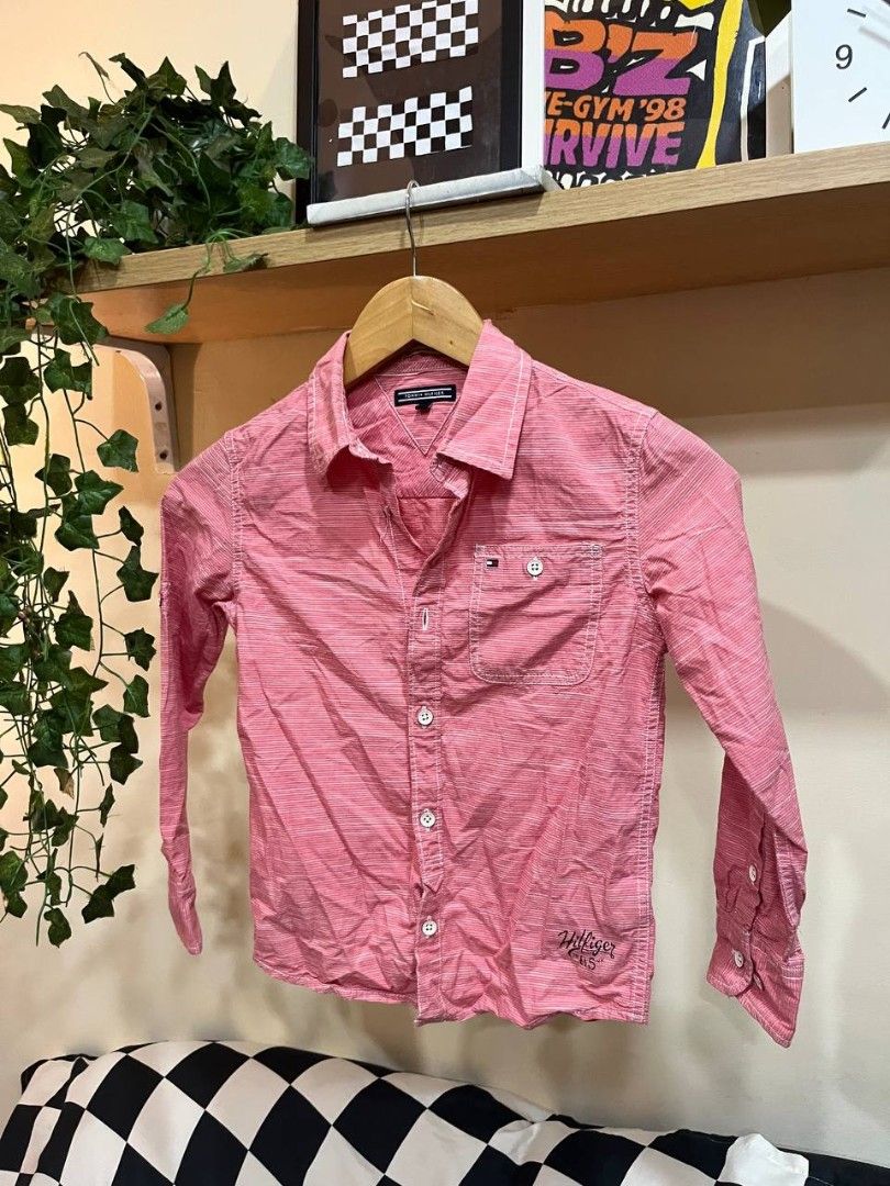 Tommy Hilfiger pink long-sleeve button-down shirt (Category: Babies & Kids Fashion) located in Quezon City. Submitted by michypeachyy1 (Listing ID 1467545788, Image 1). Description: 350 plus ship 6 to 8 yrs old.