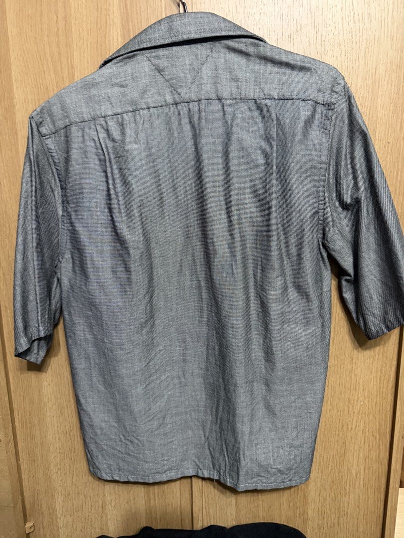 Tommy Hilfiger Slim Fit Grey Button Down Shirt (Category: Formal Shirts) located in Manila. Submitted by marclouiea70819 (Listing ID 1467560435, Image 3). Description: - Brand: Tommy Hilfiger - Color: Grey with micro texture pattern - Fit: Slim fit - Size: 14.5 (Sleeve length: 32-33) - Details: Classic collar, left chest pocket, button-down closure - Material: Lightweight, perfect for office or smart casual wear - Condition: Clean and well-mainta