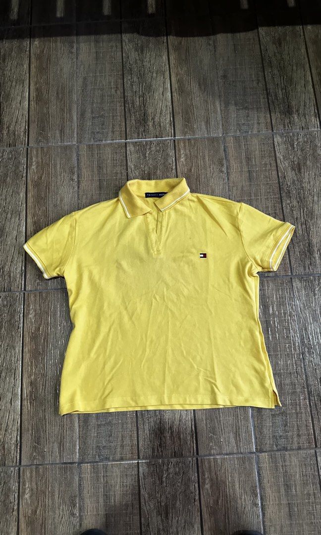 TOMMY YELLOW POLO (Category: Shirts) located in Manila. Submitted by urban-vintage_2 (Listing ID 1467517743, Image 1). Description: ISSUE: NONE ( NEED WASH ) MOP :GCASH ( NO COD ) SHIP VIA : LALAMOVE & J&T LOCATION : PASIG CITY LENGTH : 23 WIDTH : 19.