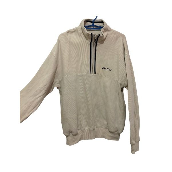Top-Flite Cream Quarter Zip Sweatshirt (Category: Coats, Jackets and Outerwear) located in San Fernando. Submitted by lovingthings1 (Listing ID 1467473404, Image 2). Description: - Brand/Style: Top-Flite quarter-zip sweatshirt - Color: Cream - Material: 100% premium cotton - Design: All-over ribbed texture with a high collar and zipper closure - Details: Small embroidered script logo on the left chest - Fit: Ribbed cuffs and hem for a snug fit - 