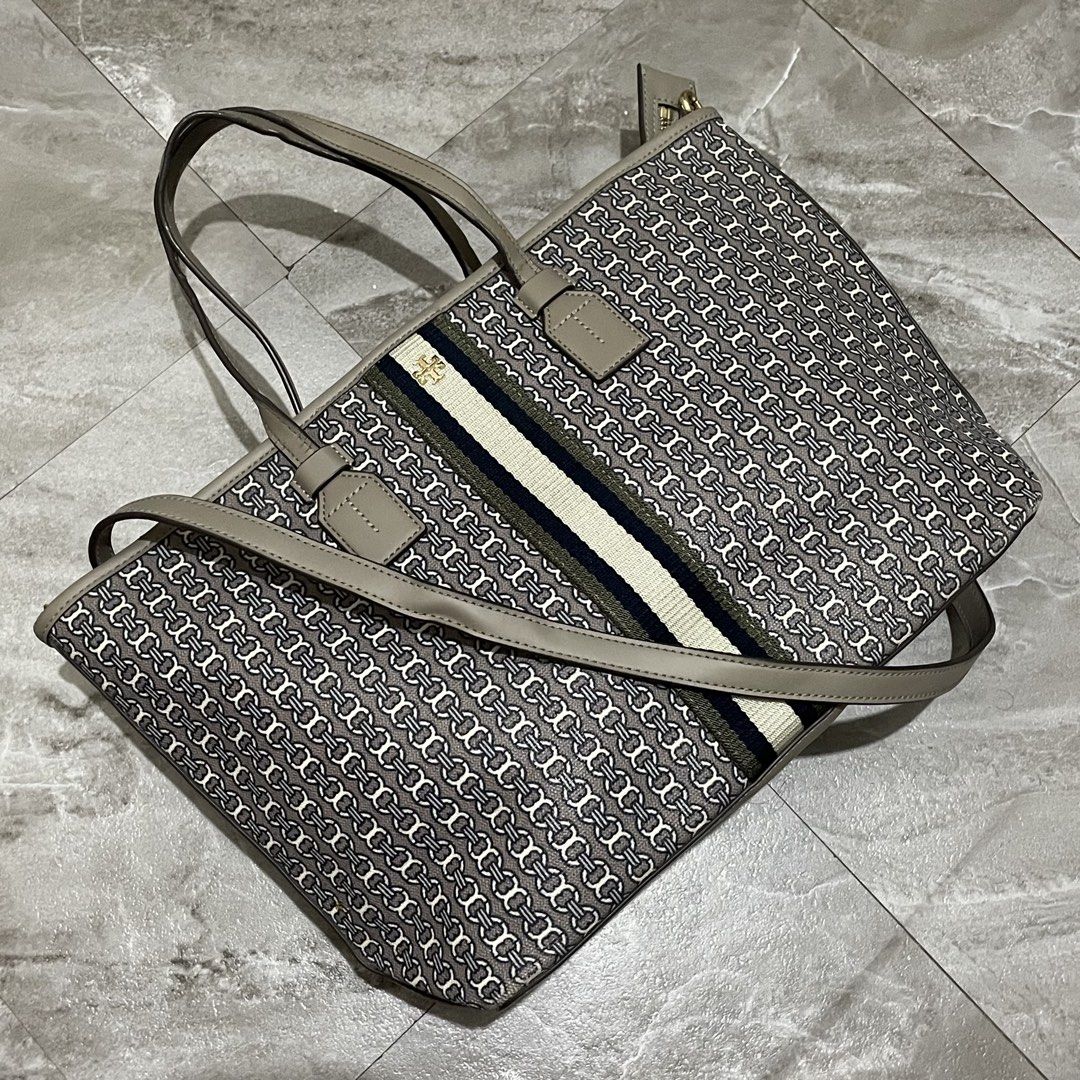 Tory Burch Monogram Canvas Tote Bag (Category: Tote Bags) located in Manila. Submitted by astral_ (Listing ID 1467571251, Image 1). Description: Tory Burch Monogram Canvas Tote Bag Size: Small Condition: 9/10 Issue: minor rubber edging crack & stain Dimes Width: 15 in Height: 9 in Depth: 4 in Price: 2,000 shipped.