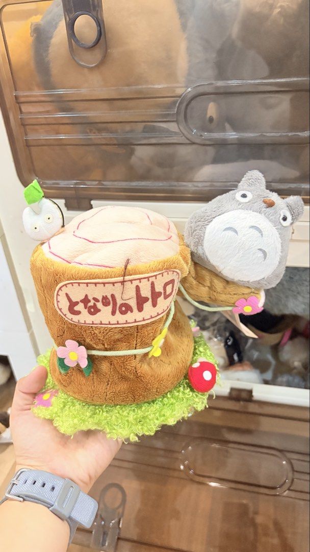 Totoro Tree Stump Plush Tissue Holder Studio Ghibli (Category: Plushies & Soft Toys) located in Cavite. Submitted by dhonnabananaaaa (Listing ID 1467526229, Image 1). Description: - Official Studio Ghibli Totoro plush toy styled like a charming tree stump - Detailed with adorable forest elements including mushrooms, flowers, and a tiny sprite - Made with super soft, high-quality material for ultimate huggability - Comes with the original tag stil