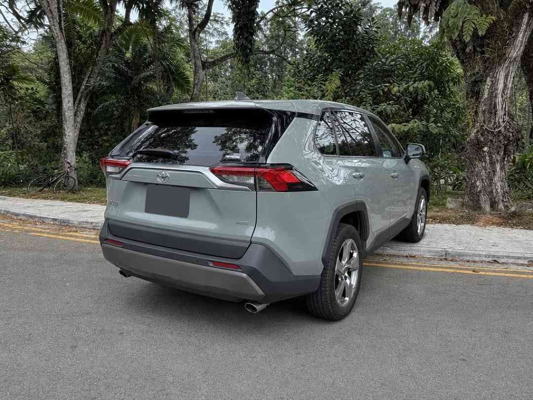 Toyota RAV4 2.0 Premium (A) (Category: Used Cars) located in Singapore. Submitted by carousell_certified_partners (Listing ID 1467532703, Image 3). Description: Superb 1 owner condition. Fully agent maintained. Extremely rare color, Urban Khaki - Classy looking pale olive green tone. Fierce striking looks combines with Toyota\'s reliability. A sporty compact crossover that suits any driver profile. Contact us to find out more today! Features: Key