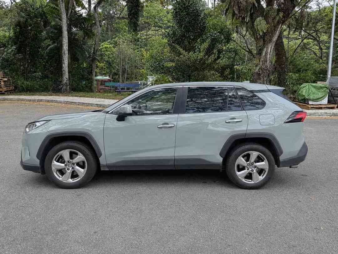 Toyota RAV4 2.0 Premium (A) (Category: Used Cars) located in Singapore. Submitted by carousell_certified_partners (Listing ID 1467532703, Image 2). Description: Superb 1 owner condition. Fully agent maintained. Extremely rare color, Urban Khaki - Classy looking pale olive green tone. Fierce striking looks combines with Toyota\'s reliability. A sporty compact crossover that suits any driver profile. Contact us to find out more today! Features: Key