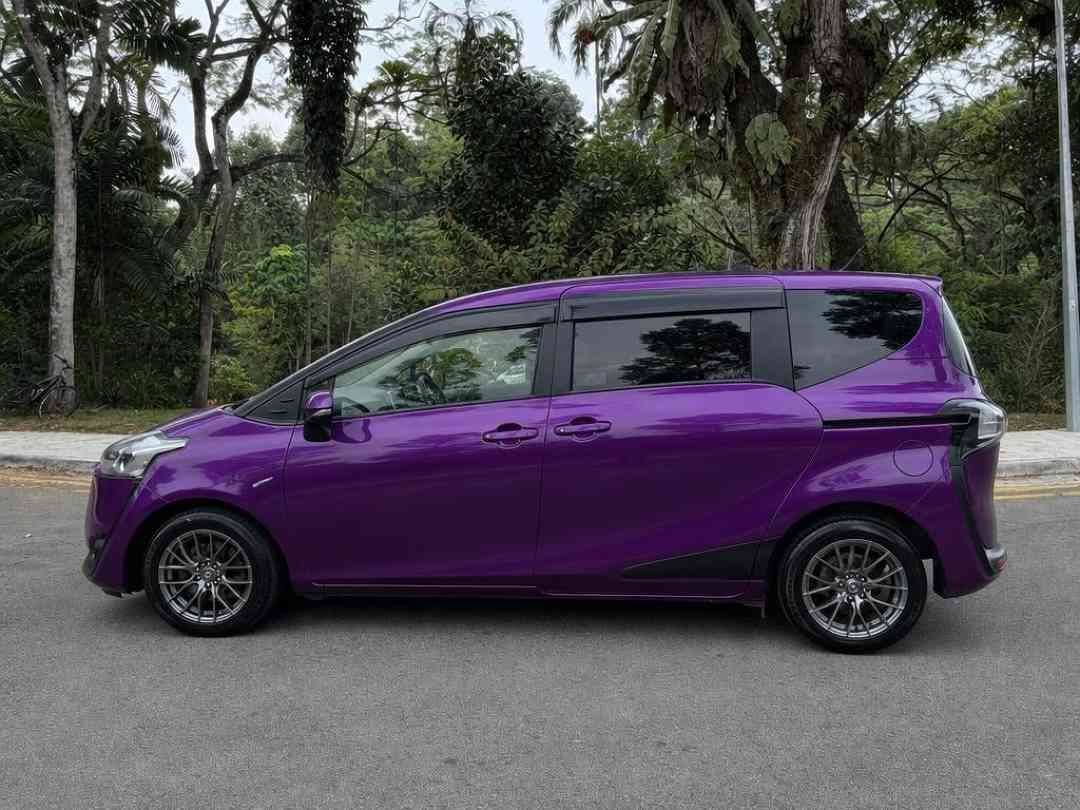 Toyota Sienta 1.5 X 7-Seater (A) (Category: Used Cars) located in Singapore. Submitted by carousell_certified_partners (Listing ID 1467532442, Image 2). Description: One owner, Best priced! Rare purple colour unit. Non PHV unit. Features: Reliable 1.5L 4cylinder in-line 16-valve DOHC Engine. Producing 107bhp & 136Nm of torque. Super CVT-i(A) Transmission. Fuel Consumption 19.6km/L. Accessories: Power sliding door. Rear Aircon. Upgraded Android Pl