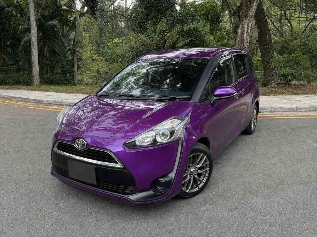 Toyota Sienta 1.5 X 7-Seater (A) (Category: Used Cars) located in Singapore. Submitted by carousell_certified_partners (Listing ID 1467532442, Image 1). Description: One owner, Best priced! Rare purple colour unit. Non PHV unit. Features: Reliable 1.5L 4cylinder in-line 16-valve DOHC Engine. Producing 107bhp & 136Nm of torque. Super CVT-i(A) Transmission. Fuel Consumption 19.6km/L. Accessories: Power sliding door. Rear Aircon. Upgraded Android Pl