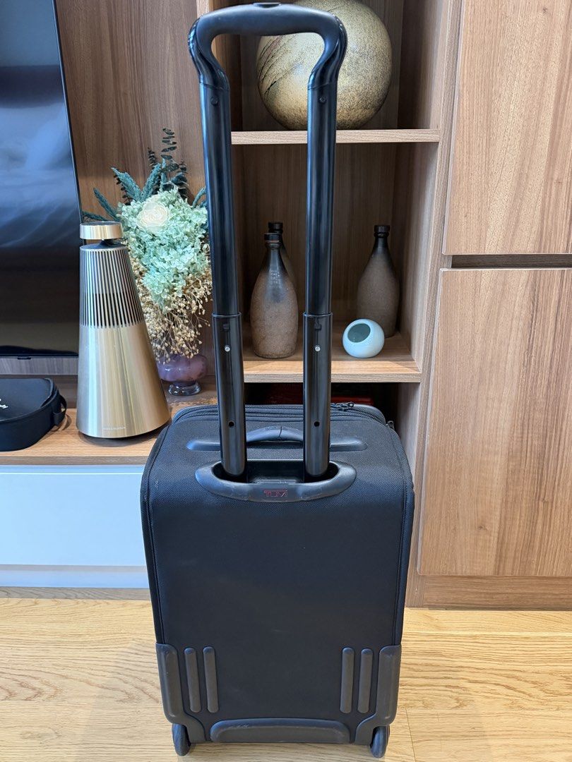 TUMI Black Rolling Carry-On Luggage Suitcase with Monogram PGP (Category: Luggage) located in Del Monte. Submitted by pgp1989 (Listing ID 1467393883, Image 2). Description: Price: ₱8,000 (Negotiable) Selling my authentic TUMI Alpha 2-Wheel Carry-On Luggage in classic black ballistic nylon. Features: * Premium, durable TUMI ballistic nylon construction * Expandable main compartment for additional packing space * Multiple front zippered compartment