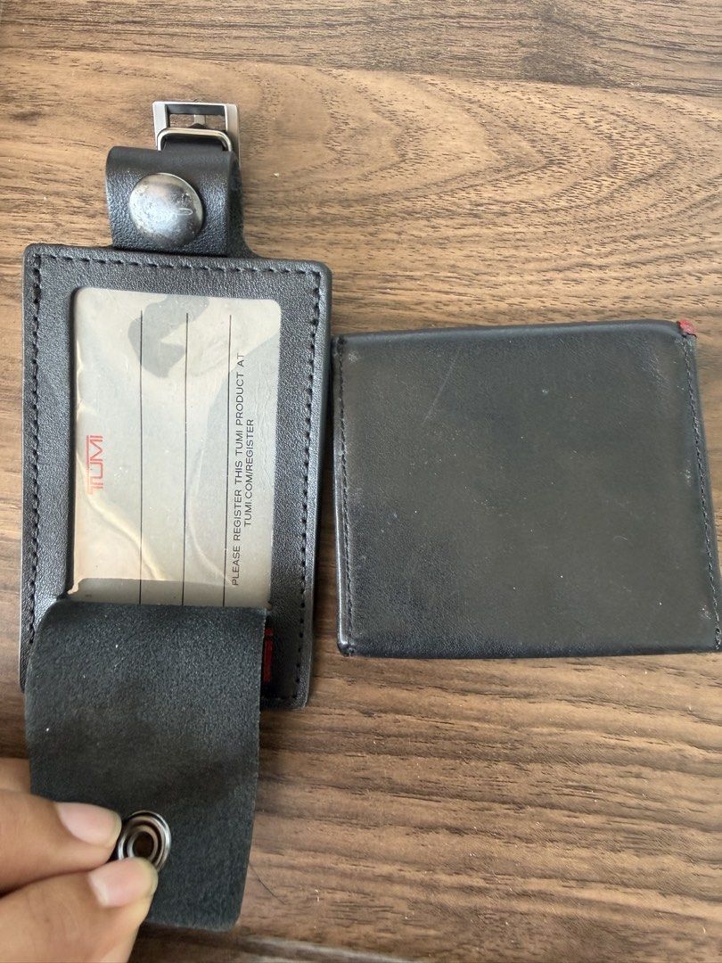 Tumi Leather Wallet and Luggage Tag Set (Category: Wallets & Card Holders) located in Digos. Submitted by old_soul. (Listing ID 1467396479, Image 3). Description: Travelers know the feeling of things made to last. Vintage Tumi leather accessories featuring that classic retro red logo. Durable, functional, and full of quiet utility. ✈️ Tumi leather wallet and matching luggage tag. Black leather build with red Tumi branding on the tag. Wallet opens