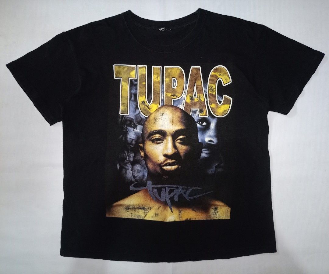 Tupac Graphic Print Black T-Shirt (Category: Tshirts & Polo Shirts ) located in Caloocan City. Submitted by grandturtle-371b8d (Listing ID 1467397299, Image 1). Description: - Color: Classic Black - Design: Bold Tupac graphic print with lettering on both front and back - Fit: Standard fit with short sleeves and crew neck - Style: Vintage hip-hop aesthetic, heavy-duty chest prints - Versatility: Easy to style with jeans, cargo pants, or joggers - 