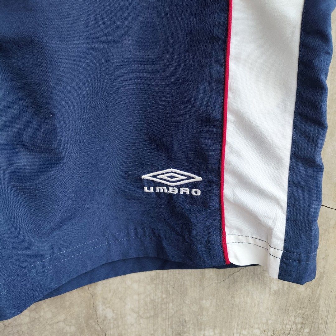 Umbro Nylon Shorts (Category: Shorts) located in Tayabas. Submitted by streetdept.ph (Listing ID 1467444013, Image 3). Description: Umbro Nylon Shorts Measurements (inches): Waist 38 (adjustable) Length 18 Leg opening 13.5 Size: Medium on tag Excellent condition No flaws .