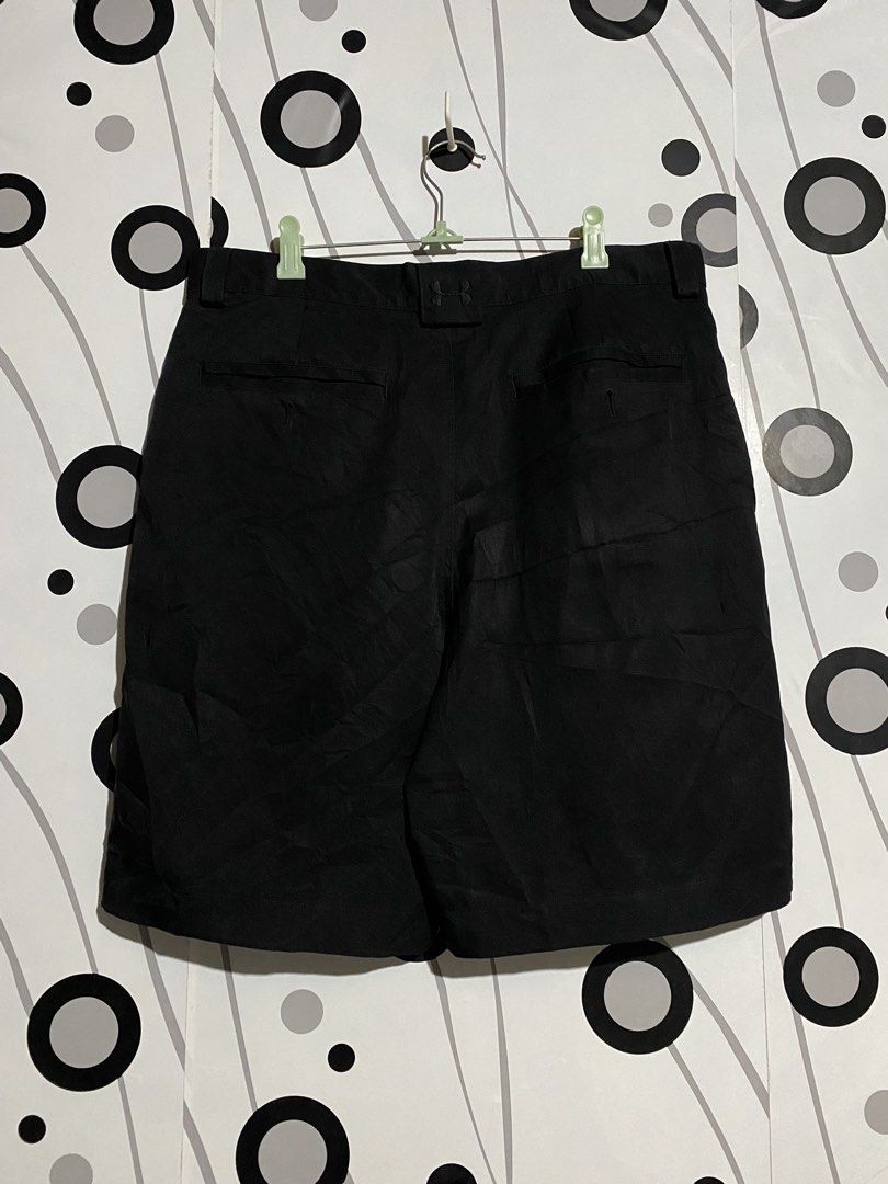 Under Armour men's athletic shorts (Category: Shorts) located in Cebu City. Submitted by patspickph (Listing ID 1467473053, Image 2). Description: This is a black Under Armour men's athletic shorts featuring an embroidered Under Armour logo tab at the center-back waistband. W34-35 L20.5👍No issue Excellent Condition👌.