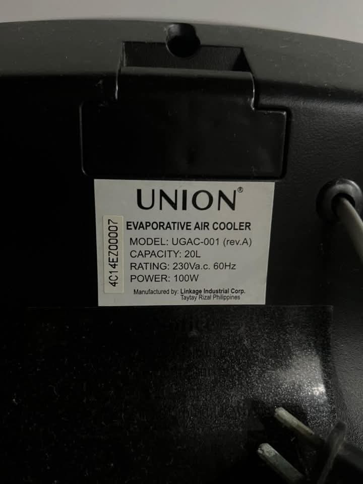 Union UGAC-001 20L Evaporative Air Cooler (Category: Air Conditioning and Heating) located in Quezon City. Submitted by silverforest_0cab92 (Listing ID 1467383078, Image 3). Description: - Brand/Model: Union Evaporative Air Cooler (UGAC-001) - Water Tank Capacity: Large 20 Liters - Power: 100W (230V, 60Hz) - Controls: Digital control panel with speed settings, timer, and swing modes - Cooling Feature: High-efficiency honeycomb cooling pads - Cond
