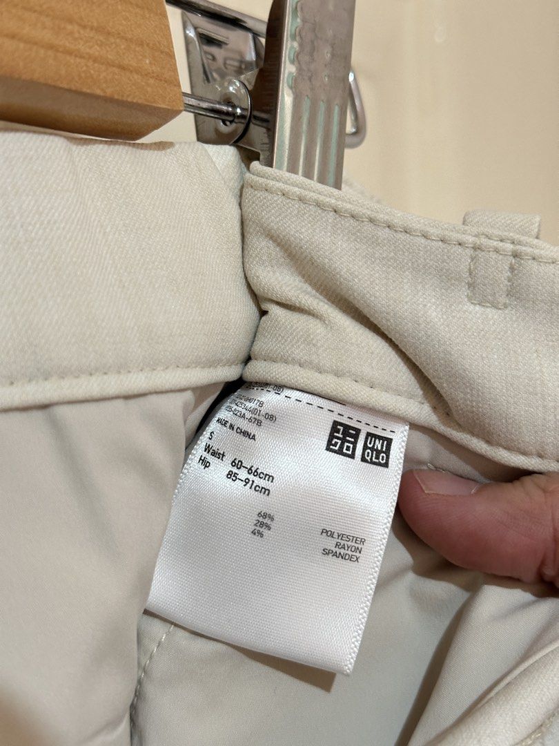 Uniqlo Beige Smart Ankle Pants Size S (Category: Trousers) located in Manila. Submitted by ktyyycloset (Listing ID 1467445084, Image 2). Description: - Brand/Item: Uniqlo Beige Ankle-Length Trousers - Size: S (Fits waist 60-66cm, hips 85-91cm) - Material: 68% polyester, 28% rayon, 4% spandex (super comfortable with stretch) - Design: Straight leg cut, clean cream color, belt loops, and dual back welt pockets - Style: Great staple piece for both o