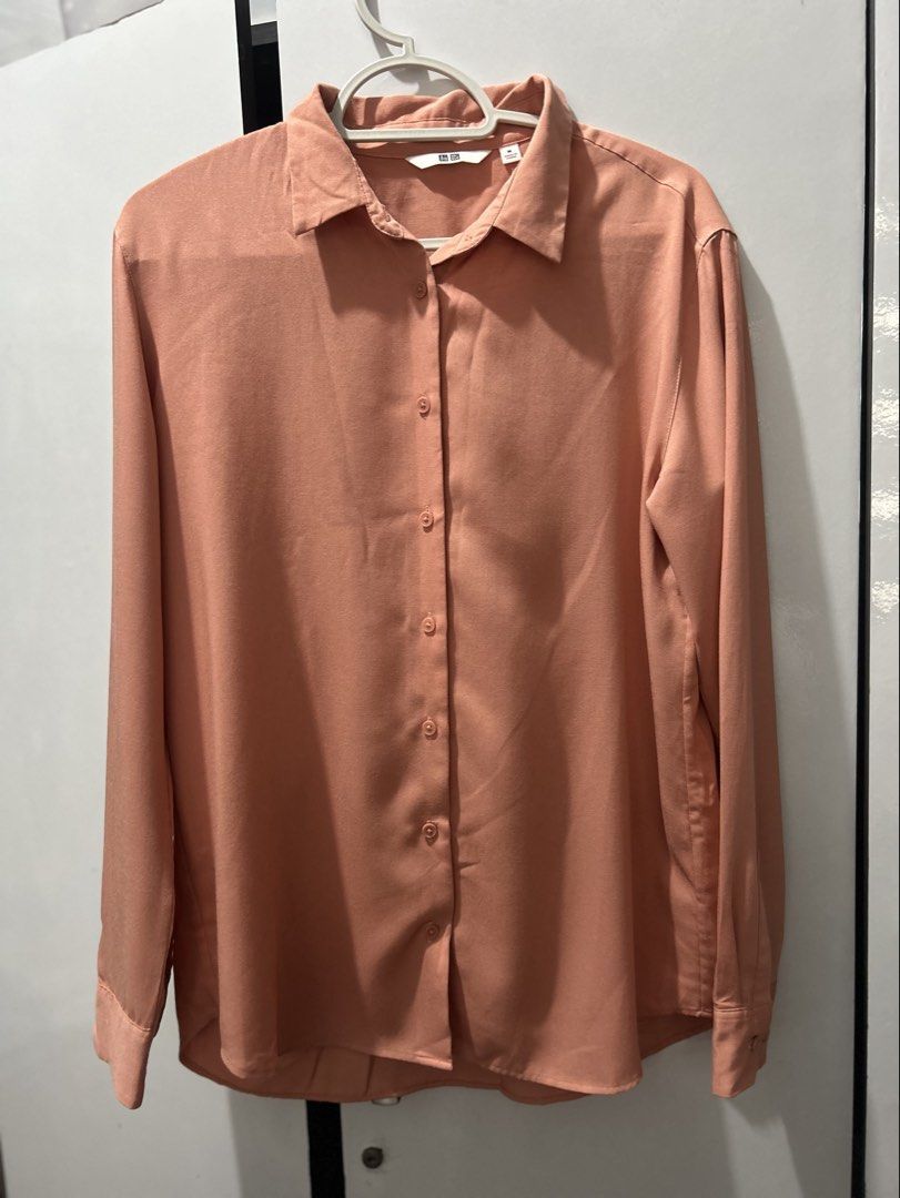 Uniqlo Rayon Long-Sleeve Blouse (Category: Blouses) located in Pasig City. Submitted by ladyleslieisletavelarde4902 (Listing ID 1465241947, Image 1). Description: A versatile, easy-care blouse that adds a warm pop of color to your casual or office wardrobe Brand: Uniqlo Tag Size: M / Fits S to M Purchase direct from store. MOP: Gcash / Bank Transfer Delivery: SF shouldered by buyer .
