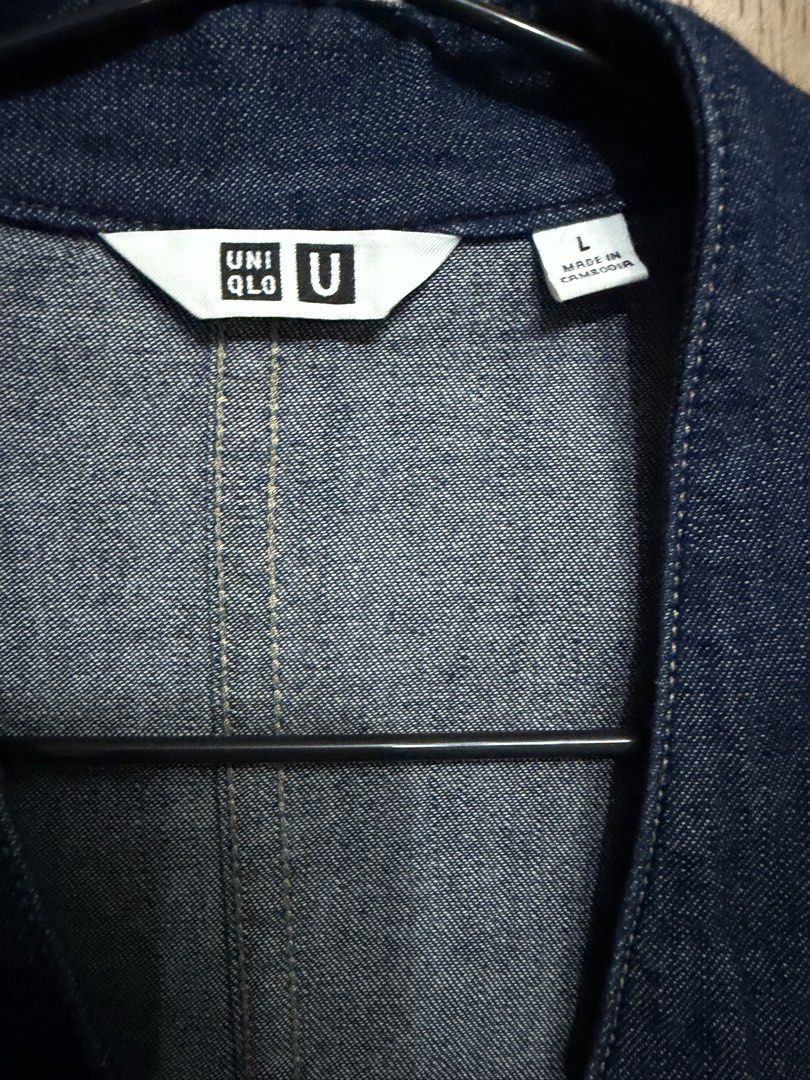 Uniqlo U Denim Long Sleeve Jacket Size L (Category: Coats, Jackets and Outerwear) located in Manila. Submitted by marclouiea70819 (Listing ID 1467561349, Image 2). Description: - Brand/Model: Uniqlo U Denim Jacket - Color: Dark Blue - Size: Large (L) - Design: Button-up front, collarless neckline, single front pocket - Material: Soft denim, perfect for layering over tees or hoodies - Condition: Clean inside and out, all labels intact - Origin: Ma