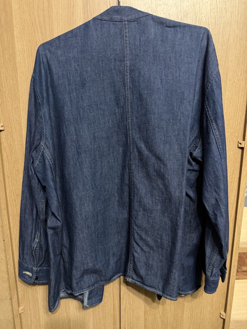 Uniqlo U Denim Long Sleeve Jacket Size L (Category: Coats, Jackets and Outerwear) located in Manila. Submitted by marclouiea70819 (Listing ID 1467561349, Image 3). Description: - Brand/Model: Uniqlo U Denim Jacket - Color: Dark Blue - Size: Large (L) - Design: Button-up front, collarless neckline, single front pocket - Material: Soft denim, perfect for layering over tees or hoodies - Condition: Clean inside and out, all labels intact - Origin: Ma