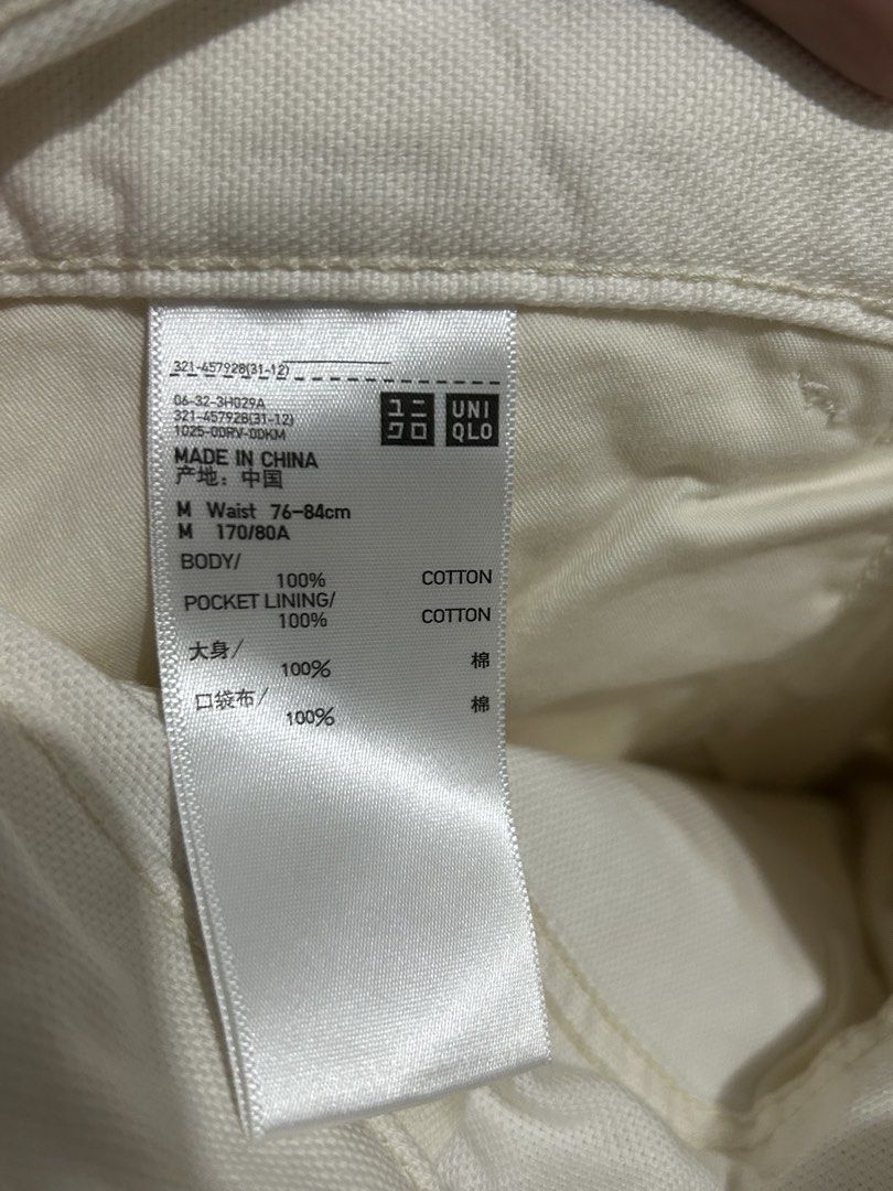 Uniqlo White Utility Work Pants Size M (Category: Trousers) located in Manila. Submitted by found1_mnl (Listing ID 1467516649, Image 2). Description: - Brand: Uniqlo - Item: Utility Pants with Double Knee Styling - Color: White - Size: M (Waist fits 76 to 84 cm) - Material: 100% Cotton (Body and Pocket Lining) - Features: Durable canvas material, classic workwear panels, Made in China - Condition: Clean overall with minimal signs of wear W-17” L-