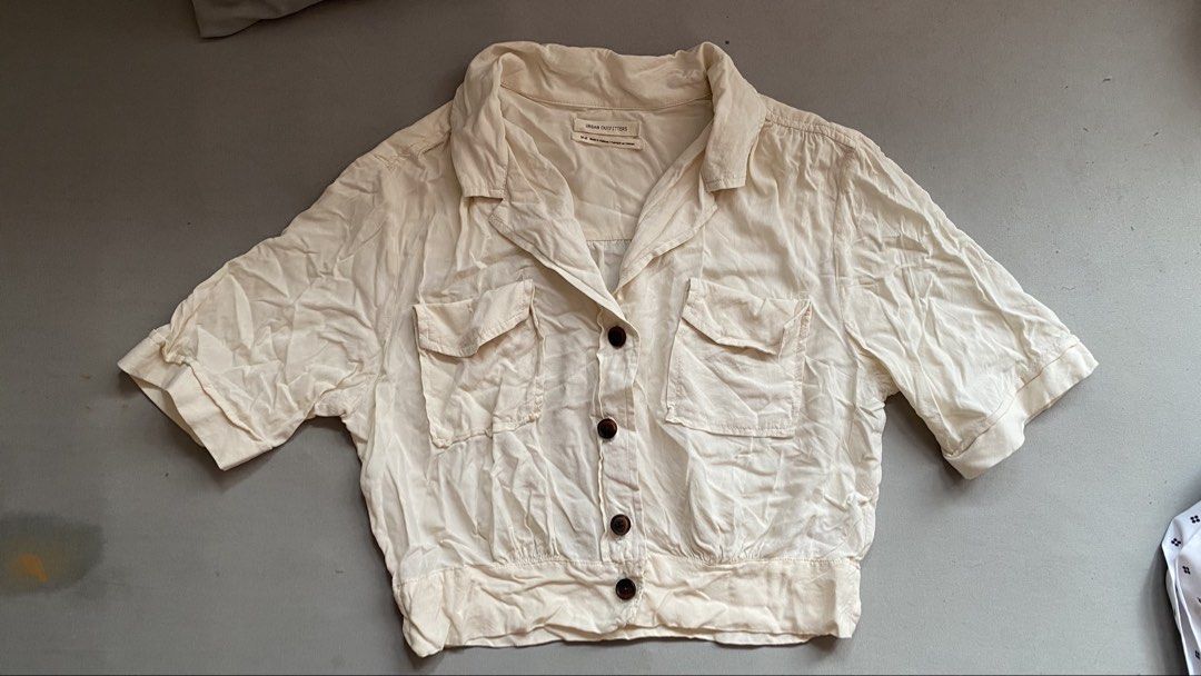 Urban Outfitters • Basic Polo Button Top (altered na po yung dulo) (Category: Blouses) located in Santa Rosa. Submitted by 07mkl (Listing ID 1467395127, Image 2). Description: Urban Outfitters • Basic Polo Button Top (altered na po yung dulo) • Condition: 9/10 • Flaws: none • Color: Beige/Cream ₱130✨ inalter ko na yung dulo, tinangal ko yung tale sa dulo, pinalitan ko ng button din..