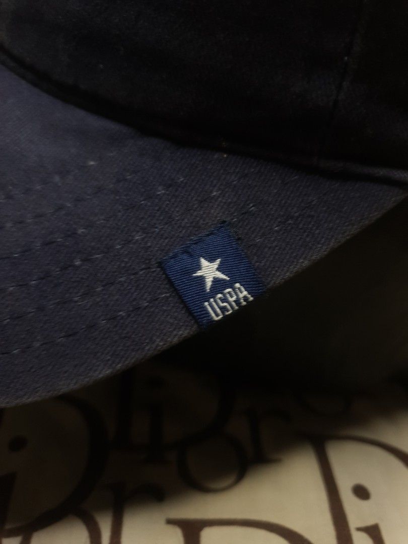 USPA us polo assassin dad hat (Category: Caps & Hats) located in San Fernando. Submitted by retro.district. (Listing ID 1467519789, Image 3). Description: - USPA dad hat Ralph Lauren RL vibes - Size: Adjustable belts strap - Condition: Excellent - No issue - Color Rate: 9.5/10.