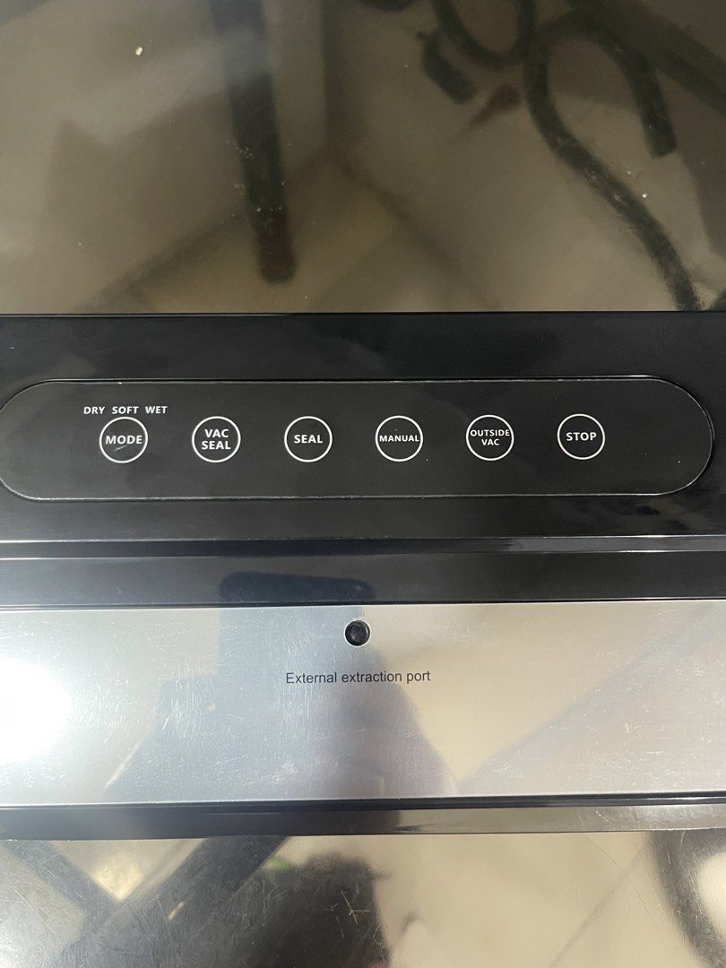 Vacuum Preservation Sealing Machine GW-01 (Category: Craft Supplies & Tools) located in Manila. Submitted by sheenasott40644 (Listing ID 1467365670, Image 3). Description: - Sleek black finish with a stylish silver accent panel - Multiple modes: Vac Seal, Seal, Manual, Outside Vac, and Stop - Keeps food fresh, flavorful, and airtight for longer - Complete set with original box, protective foam inserts, and instruction manual - Perfect for home me
