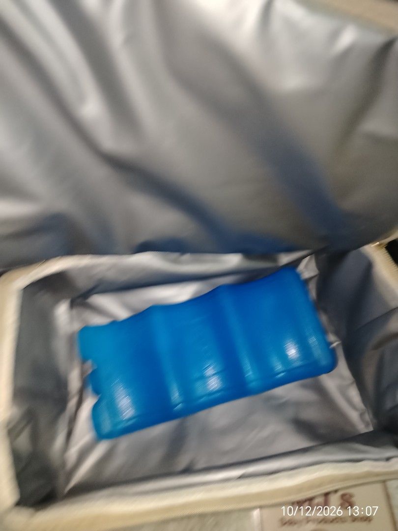 V-Cool professional cooler bag with ice pack (Category: Tote Bags) located in Pulilan. Submitted by mjbabyproductsshop (Listing ID 1467479089, Image 2). Description: - Brand: V-Cool professional cooler bag - Color: Black - Purpose: Keeps milk bottles and pump gear cold on the go - Inclusions: Includes a blue contoured ice pack - Features: Dual zipper design opens wide for easy access - Capacity: Plenty of room for a breast pump or storage bags - 