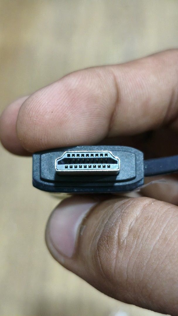 Vention Wireless HDMI Transmitter TX Adapter (Category: Cables & Adaptors) located in Bulacan. Submitted by jlmallari95 (Listing ID 1467516287, Image 2). Description: - Brand: Vention Wireless HDMI Transmitter (TX) - Connector: Standard HDMI male with protective cap and rubber strap - Ease of Use: Central pairing button for quick connection - Power: USB Type-C port (5V/2A requirement) - Design: Built-in cooling vents for stable performance - Comp