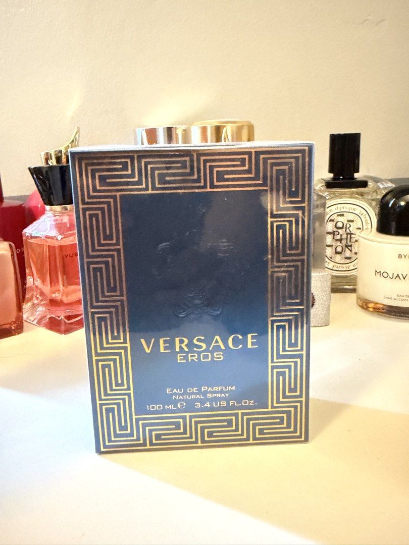 Versace Eros Eau De Parfum 100ml (Category: Fragrance & Deodorants) located in Tarlac. Submitted by jzennoroyy-32960 (Listing ID 1467378488, Image 1). Description: - Brand: Versace Eros Eau de Parfum - Size: 100ml / Natural Spray - Condition: Brand new, 100% unopened in original plastic wrap - Packaging: Vibrant blue box with gold Greek key pattern - Authenticity: Clear barcode and batch details on bottom flap - Ideal for: Fragrance collectors an