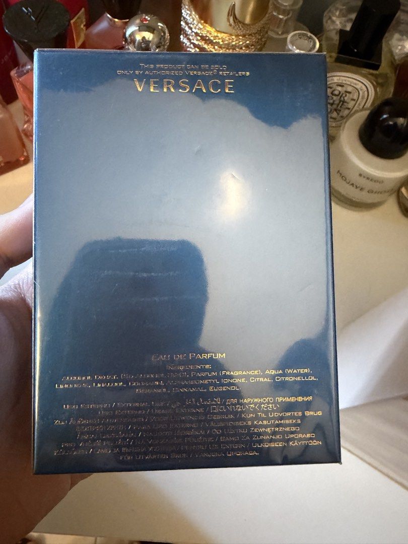 Versace Eros Eau De Parfum 100ml (Category: Fragrance & Deodorants) located in Tarlac. Submitted by jzennoroyy-32960 (Listing ID 1467378488, Image 3). Description: - Brand: Versace Eros Eau de Parfum - Size: 100ml / Natural Spray - Condition: Brand new, 100% unopened in original plastic wrap - Packaging: Vibrant blue box with gold Greek key pattern - Authenticity: Clear barcode and batch details on bottom flap - Ideal for: Fragrance collectors an
