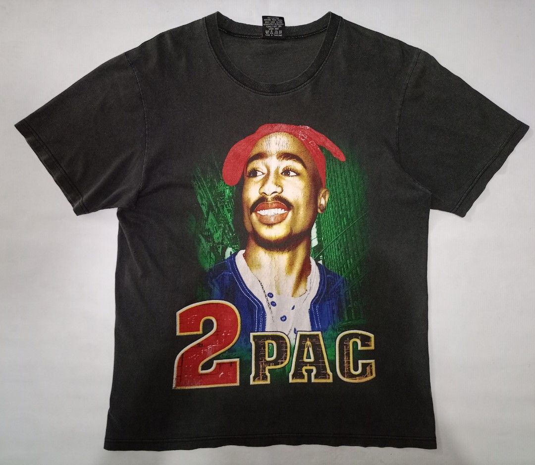 Vintage 2Pac Tupac Graphic Tee Hot Eagle Size L (Category: Tshirts & Polo Shirts ) located in Caloocan City. Submitted by grandturtle-371b8d (Listing ID 1467397244, Image 1). Description: - Item: Hot Eagle 2Pac Black T-Shirt - Size: L (Regular fit, short sleeve, standard crew neck) - Design: Big graphic print featuring Tupac and lettering on both front and back - Material: 100% cotton, made in Thailand - Style: Washed dark color look.
