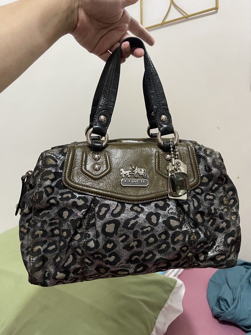Vintage Coach Leopard Madison satchel handbag (Category: Shoulder Bags) located in Cabiao. Submitted by imeon13 (Listing ID 1467562621, Image 2). Description: excellent condition flaws see pic ung sa loob na tag cracks na due to kalumaan, plus needs wash skull panda charm not included.