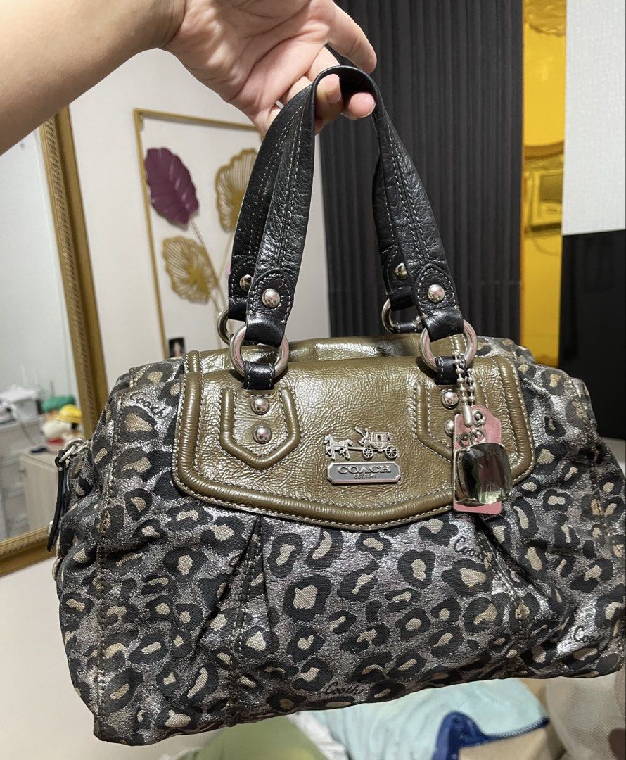 Vintage Coach Leopard Madison satchel handbag (Category: Shoulder Bags) located in Cabiao. Submitted by imeon13 (Listing ID 1467562621, Image 3). Description: excellent condition flaws see pic ung sa loob na tag cracks na due to kalumaan, plus needs wash skull panda charm not included.