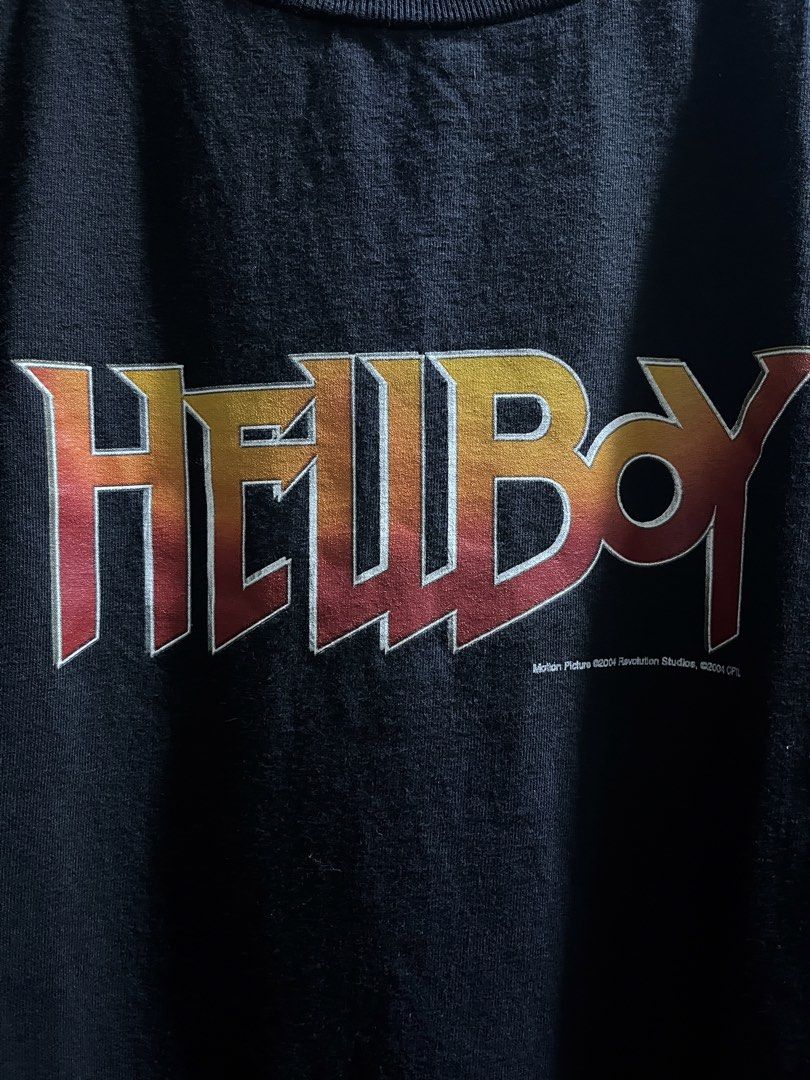 Vintage Hellboy shirt (Category: Tshirts & Polo Shirts ) located in San Simon. Submitted by t3_thrifts (Listing ID 1467571880, Image 2). Description: This is a vintage 2004 Hellboy movie promo t-shirt. Dimensions: 22W x 32L Issue/s: None Price: 1,300 Courier: J&T, Lalamove, LBC Seller location: Apalit Pampanga.